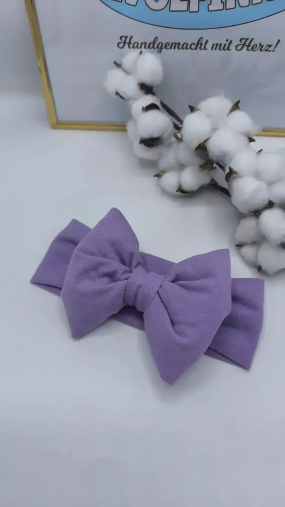 Lila trakica za kosu 